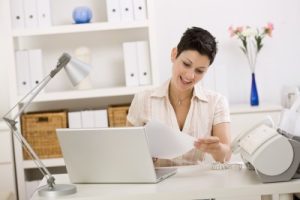 self disciplined woman working at home