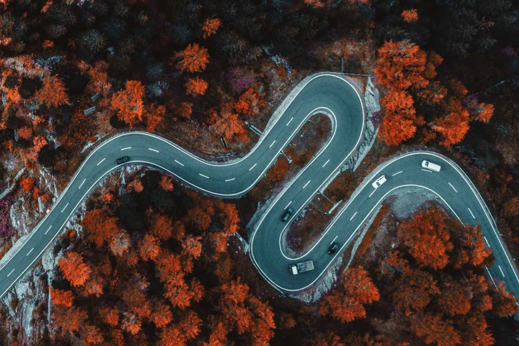 Very curvy road in wooded area